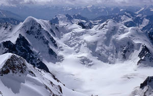 Snowy Mountains Windows Winter Wallpaper