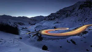 Snowy Road On A Winter's Day Wallpaper