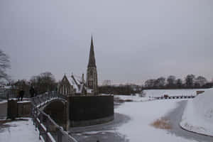 Snowy St Albans Churchand Bridge Wallpaper
