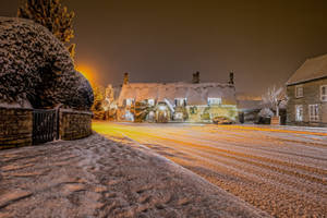 Snowy Village In England Wallpaper