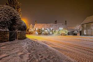 Snowy Village In England Wallpaper