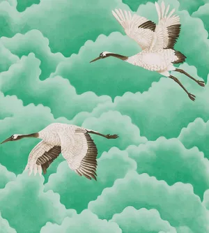 Soaring Cranes Cloudy Sky Wallpaper