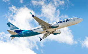 Soaring Westjet Airplane Wallpaper