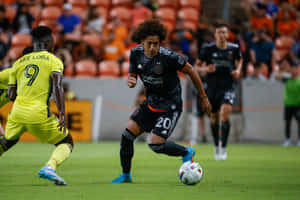 Soccer Action Ake Lobaand Opponent Wallpaper