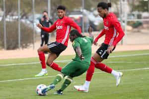 Soccer Actiononthe Field Wallpaper