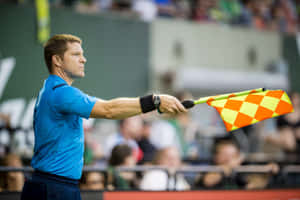 Soccer Assistant Referee Signaling Wallpaper