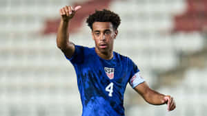 Soccer Captain Leading His Team Wallpaper