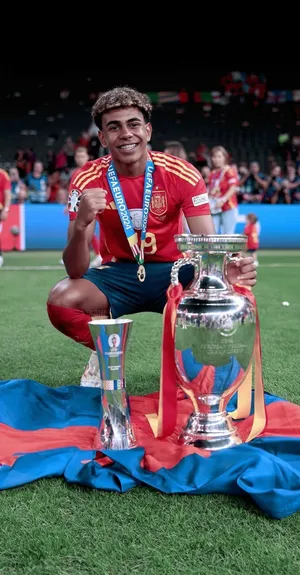 Soccer Championwith Trophyand Medal Wallpaper