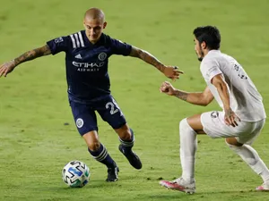 Soccer Dribble Action Shot Wallpaper