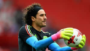 Soccer Goalkeeper Memo Ochoa Holding Ball Wallpaper