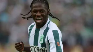 Soccer Player Celebrating On Field Wallpaper