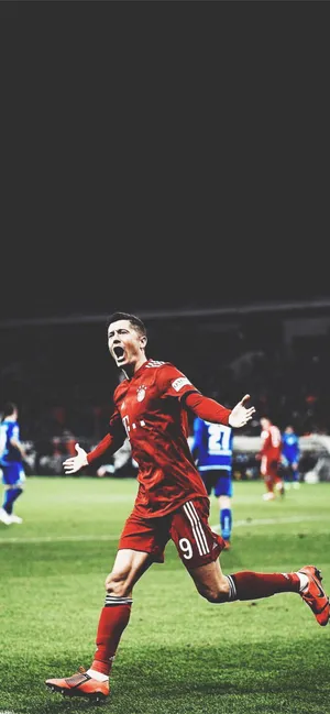 Soccer_ Player_ Celebration_ Moment.jpg Wallpaper