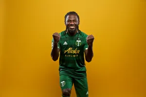 Soccer Player Celebration Yellow Background Wallpaper