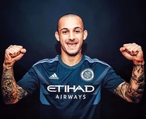 Soccer Player Celebratory Pose Wallpaper