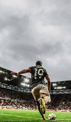 Soccer_ Player_ Corner_ Kick_ Stadium_ Background.jpg Wallpaper