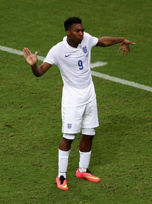 Soccer_ Player_ Goal_ Celebration_ White_ Uniform Wallpaper