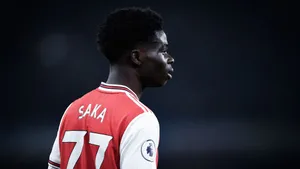 Soccer Player Saka Number77 Wallpaper