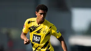 Soccer Playerin Action During Match Wallpaper