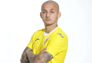 Soccer Playerin Yellow Jersey Wallpaper