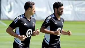 Soccer Players Training Session Wallpaper