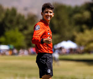 Soccer Referee Giving Thumbs Up Wallpaper