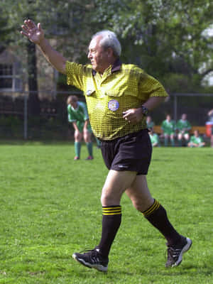 Soccer Referee In Action.jpg Wallpaper