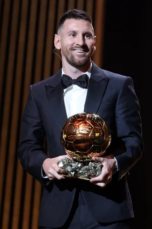 Soccer Star With Golden Ball Award Wallpaper