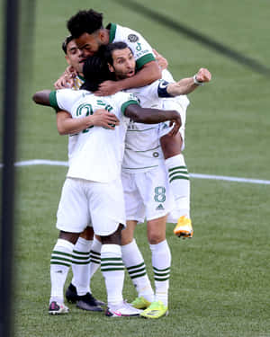 Soccer Team Celebration Huddle Wallpaper