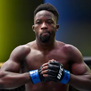 Sodiq Yusuff Punching Fists Wallpaper