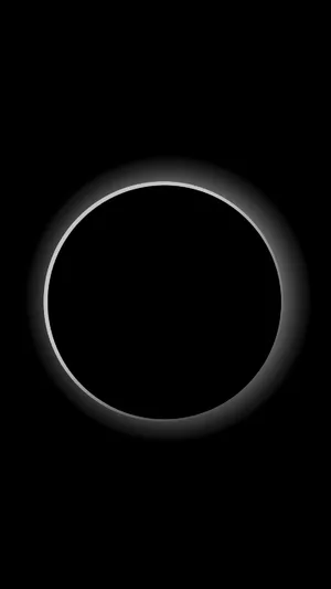 Solar Eclipse Minimalist Black Phone Wallpaper