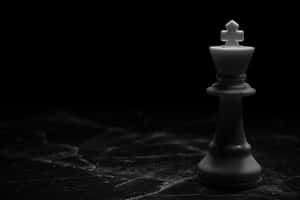 Solitary Chess Kingin Blackand White Wallpaper