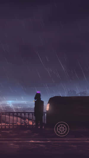 Solitary_ Figure_in_ Rainy_ Night_ Scene.jpg Wallpaper