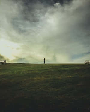 Solitary Man In Fields Wallpaper