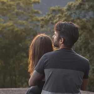 Somatic Man Holding Girl Wallpaper