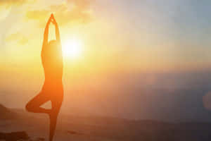 Somatic Woman Doing Yoga Wallpaper