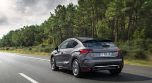 Sophisticated Elegance - Citroen Ds4 On The Road Wallpaper