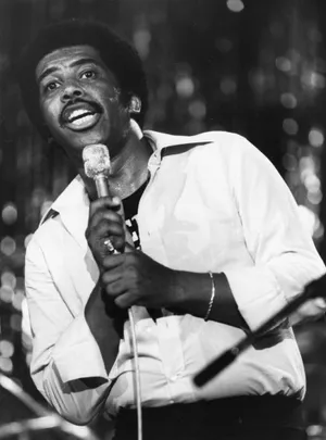 Soulful Singer Performance Microphone Wallpaper