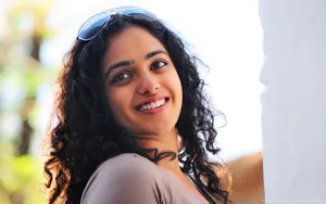 South Heroine Nithya Menen Wallpaper