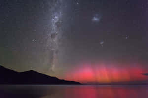 Southern Lights Under Starry Sky Wallpaper