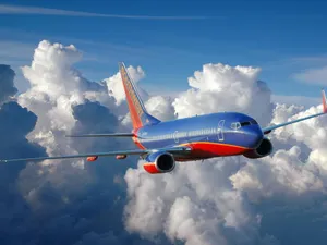 Southwest Airlines Airplane In Sea Of Clouds Wallpaper