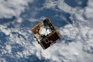 Space Debris Orbiting Earth In A Stunning Display Wallpaper