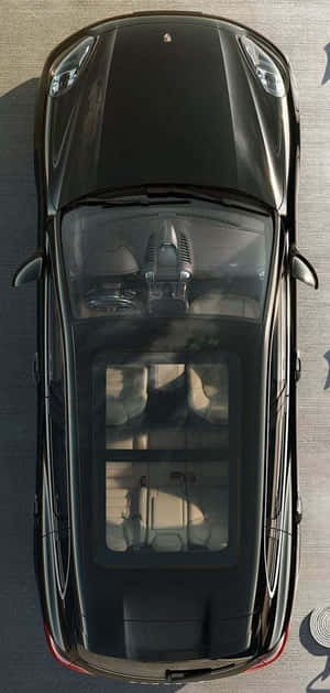 Spacious Family Car On A Scenic Road Trip Wallpaper