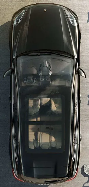 Spacious Family Car On A Scenic Road Trip Wallpaper