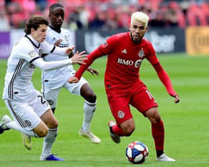 Spanish Football Player Alejandro Pozuelo Dribbling Wallpaper