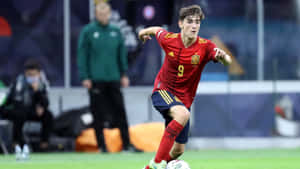 Spanish Midfielder Gavi In Action Wallpaper