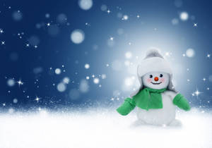 Sparkling Green Snowman Wallpaper