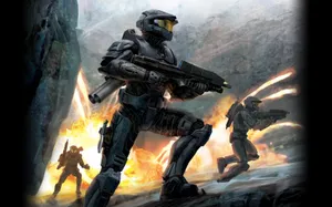 Spartan Soldiers With Advanced Weaponry In The Halo Universe Wallpaper