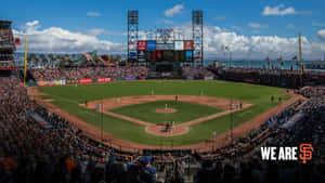 Spectacular Baseball Stadium At Night With Bright Illuminated Lights On The Field Wallpaper