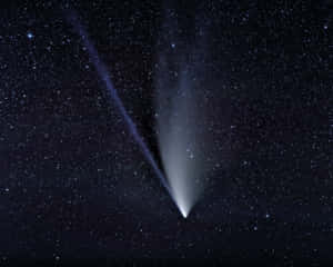 Spectacular Comet In Night Sky Wallpaper