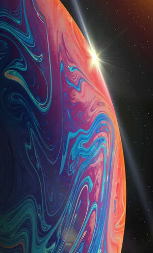Spectacular Iphone 13 Pro Featuring A Purple And Orange Planet Theme Wallpaper